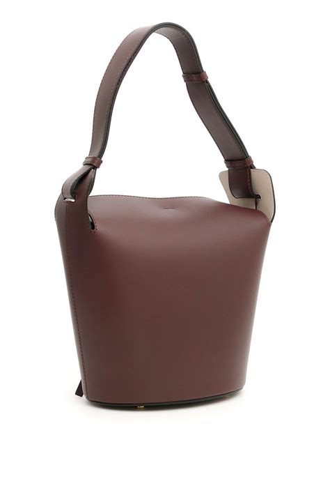 burberry london messenger bag leather deep claret|Burberry Medium Leather Bucket Bag .